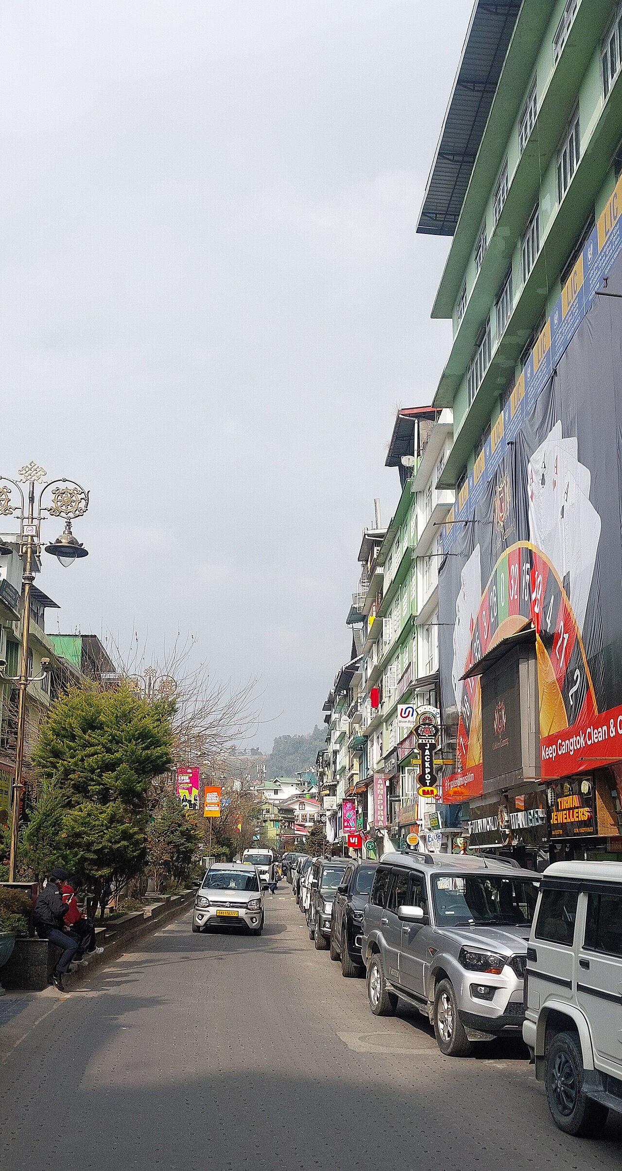 Panoramic pedestrian walkway of MG Marg surrounded by lush green Sikkim mountain slopes